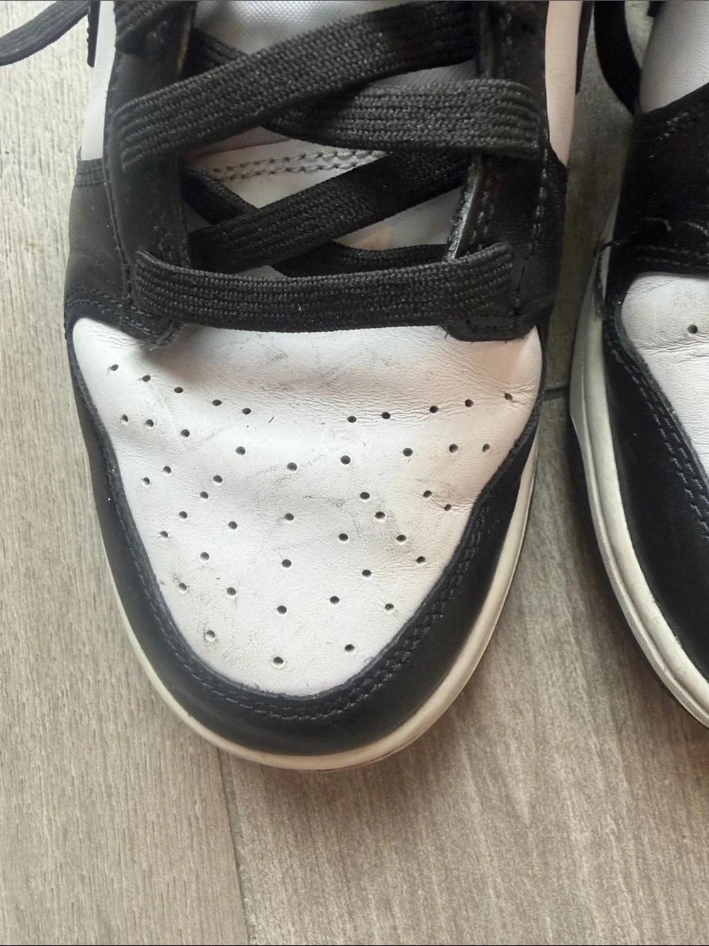 Nike Black and White Low-Top Sneakers with Swoosh